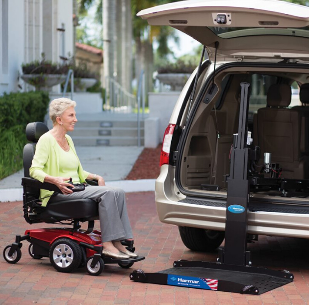 Harmar AL6000 inside platform lift loading a power chair or scooter into an SUV or minivan