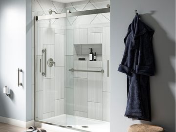 Shower with grab bars installed