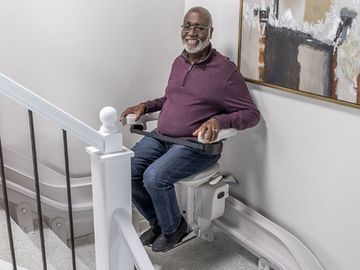 Man on stair lift