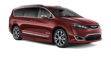 Wheelchair accessible Chrysler Pacifica handicap van with BraunAbility power fold-out ramp. Exterior view of front and passenger side of vehicle with wheelchair ramp stowed and doors closed.