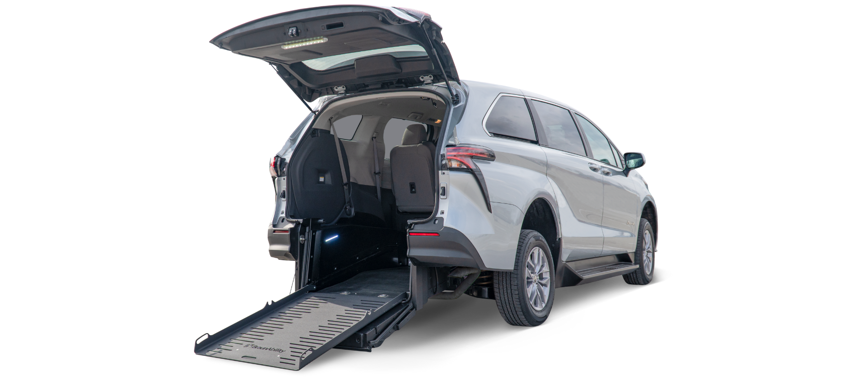 Rear-entry Toyota Sienna wheelchair van with liftgate open and ramp deployed