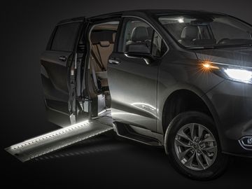 Wheelchair ramp deployed from a BraunAbility Toyota Sienna wheelchair van with lighting