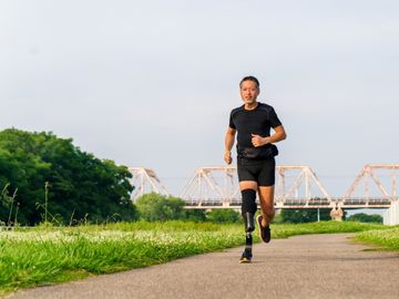 Person with prosthetic leg running