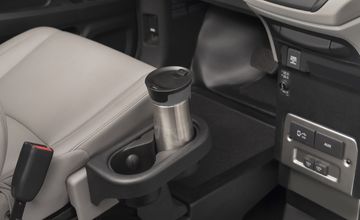 Removable cupholder attached to the driver seat in a BraunAbility Honda Odyssey wheelchair van