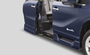 Passenger-side sliding door open with ramp stowed in a BraunAbility Honda Odyssey wheelchair van