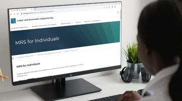 Computer monitor displaying the State of Michigan webpage for Michigan Rehabilitation Services