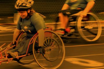 Athletes competing in a wheelchair race