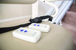 Stair lift transmitters on seat of stair lift