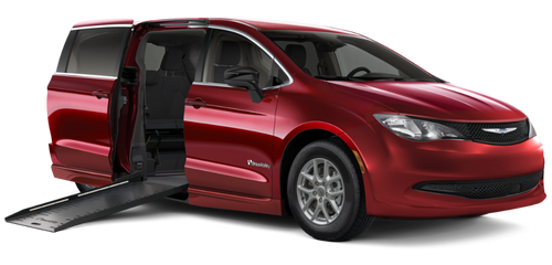 Red Chrysler Pacifica wheelchair accessible van with BraunAbility fold-out ramp deployed.