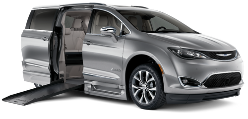 Silver Chrysler Pacifica wheelchair accessible van with BraunAbility fold-out XT ramp deployed.
