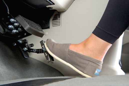 PedalMates adjustable accelerator pedal extender demonstrating improved reach and ergonomic foot positioning for driving